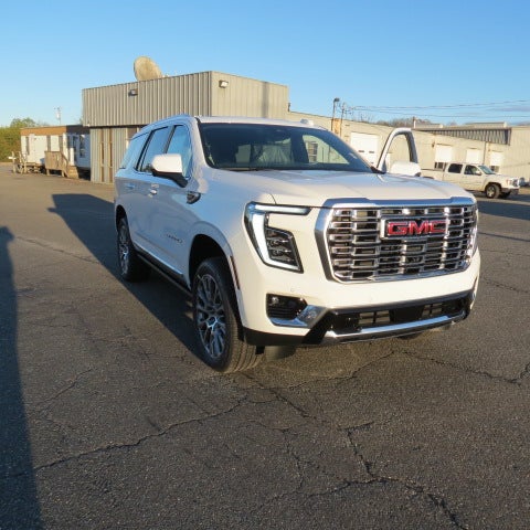 2025 GMC Yukon Denali in Summit White — front three-quarter view