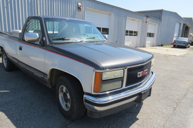 1993 GMC Sierra 1500 SLE in Silver — front three-quarter view